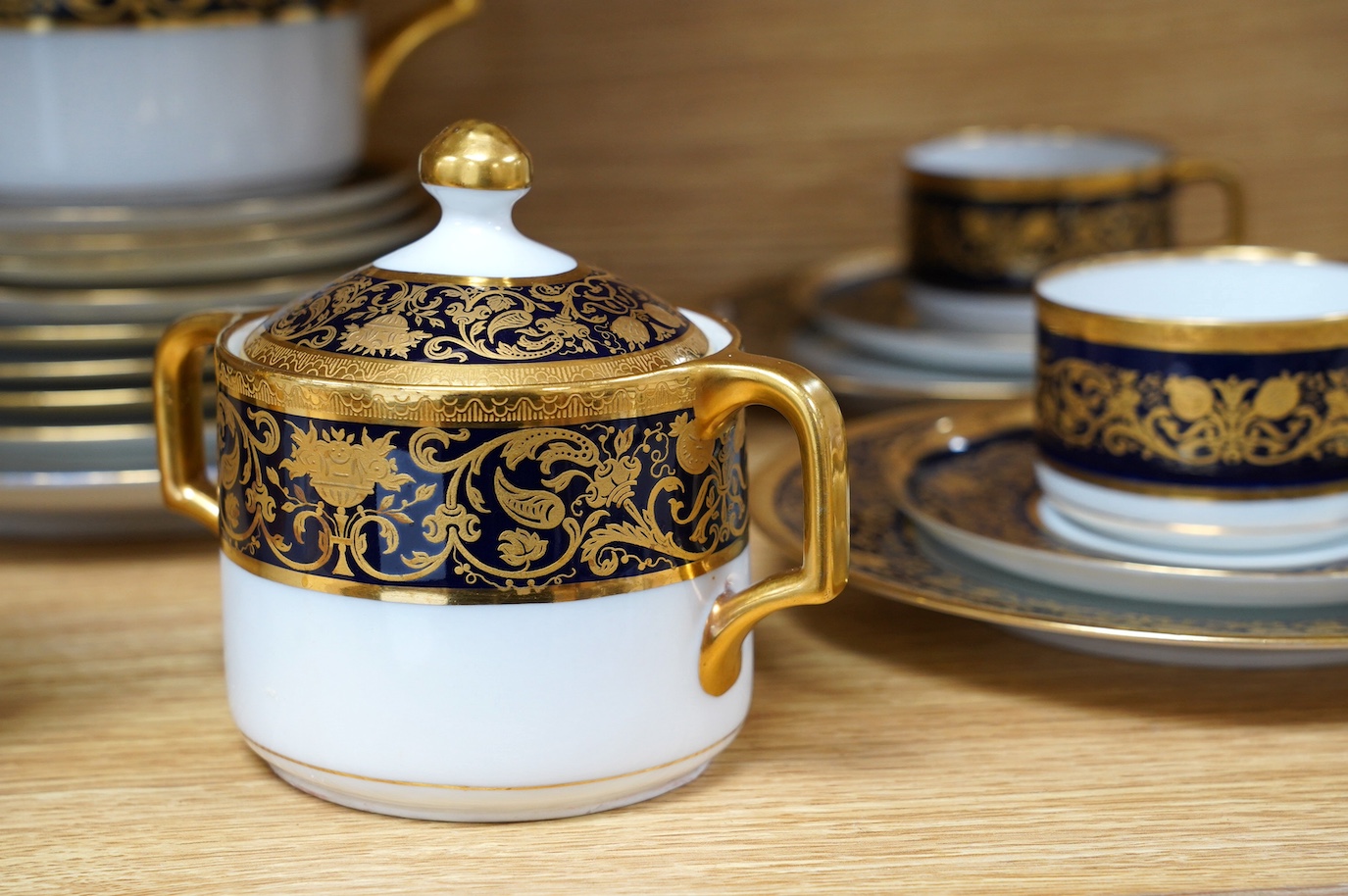 A Comte Harrach, Karlsbad, Bavarian rich dark blue and gilt banded part tea set, largest 32cm wide. Condition - fair to good
